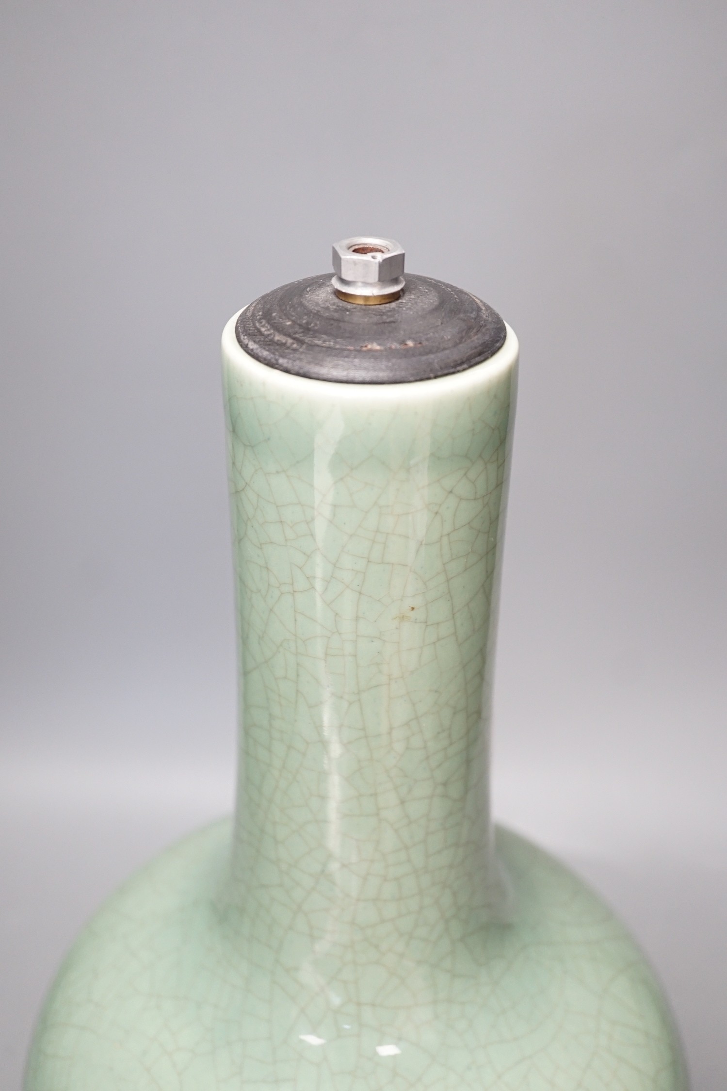 A Chinese celadon glazed Guan type vase on stand, 42cms high